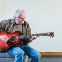 Preston guitar 300x200 circle